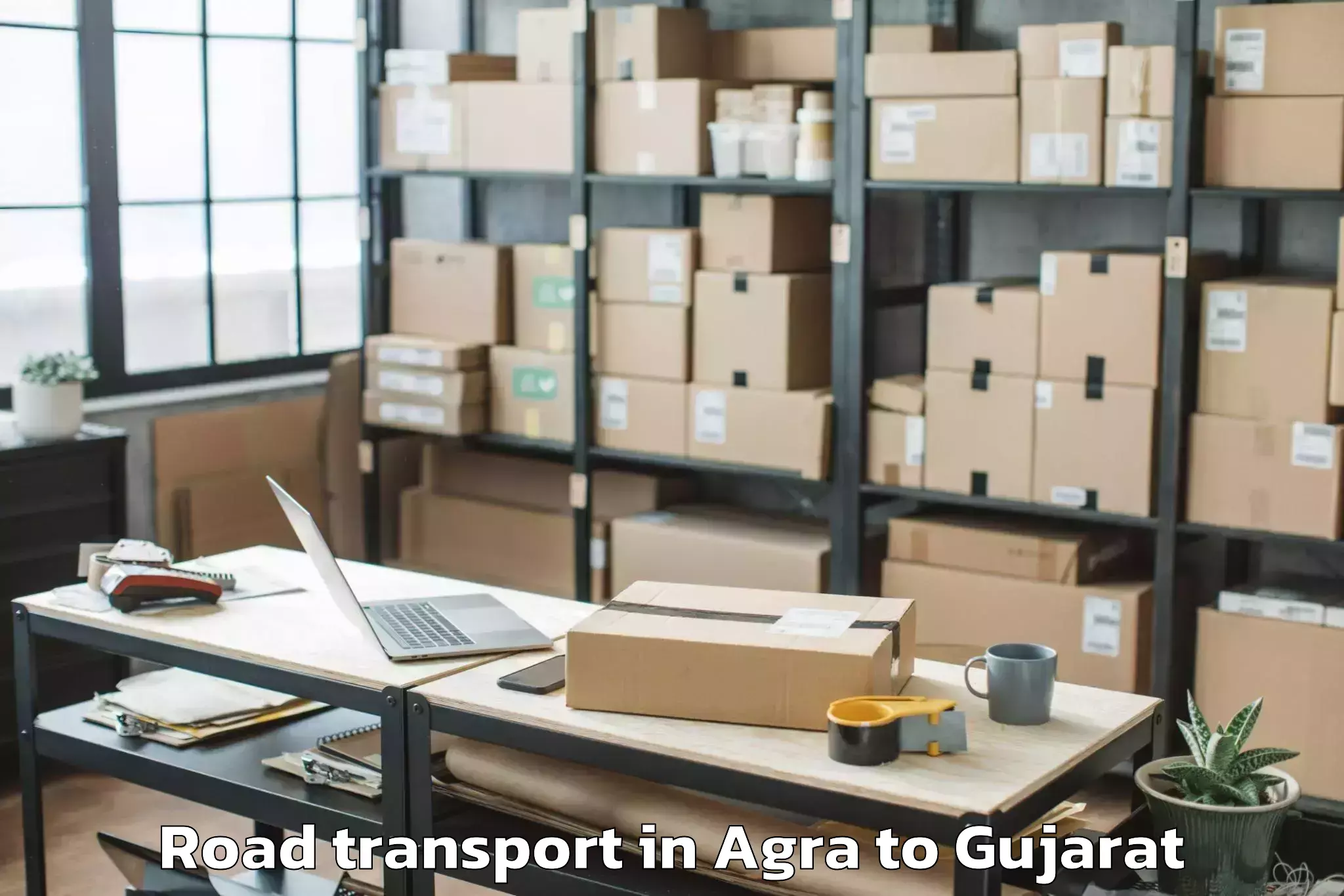 Trusted Agra to Visavadar Road Transport